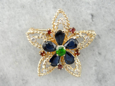 Ornate Flower and Star Multi Gemstone Brooch in Yellow Gold
