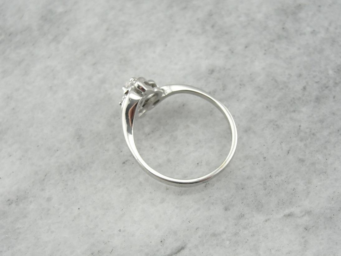 Swirling Marquise Cut Diamond Engagement Ring