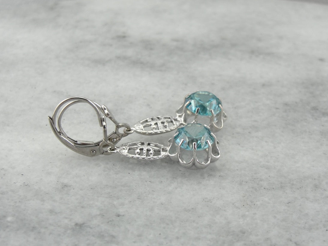 Bright Blue Zircon Buttercup Drop Earrings in White Gold