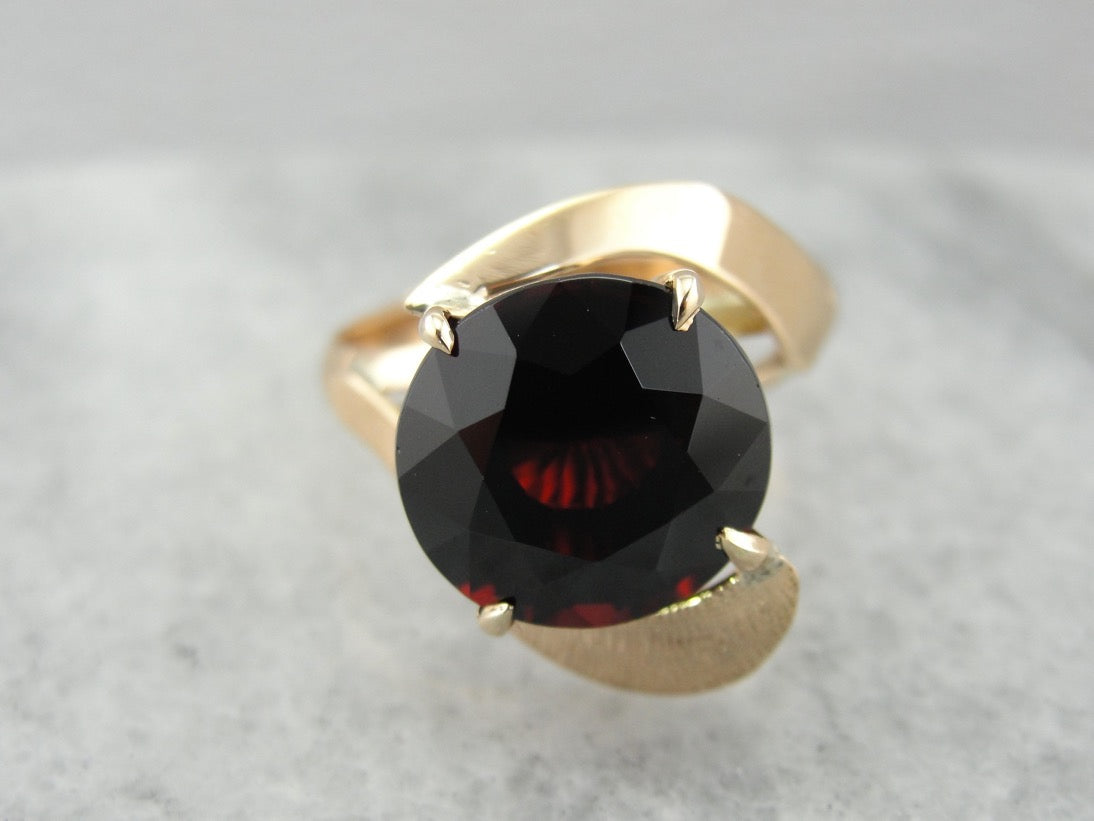 Simplistic Bypass Design Garnet Solitaire in Rosy Yellow Gold