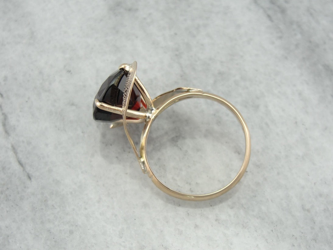 Simplistic Bypass Design Garnet Solitaire in Rosy Yellow Gold