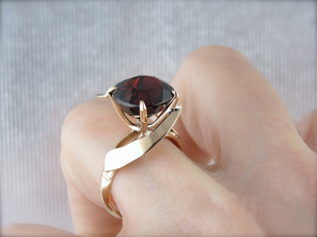 Simplistic Bypass Design Garnet Solitaire in Rosy Yellow Gold