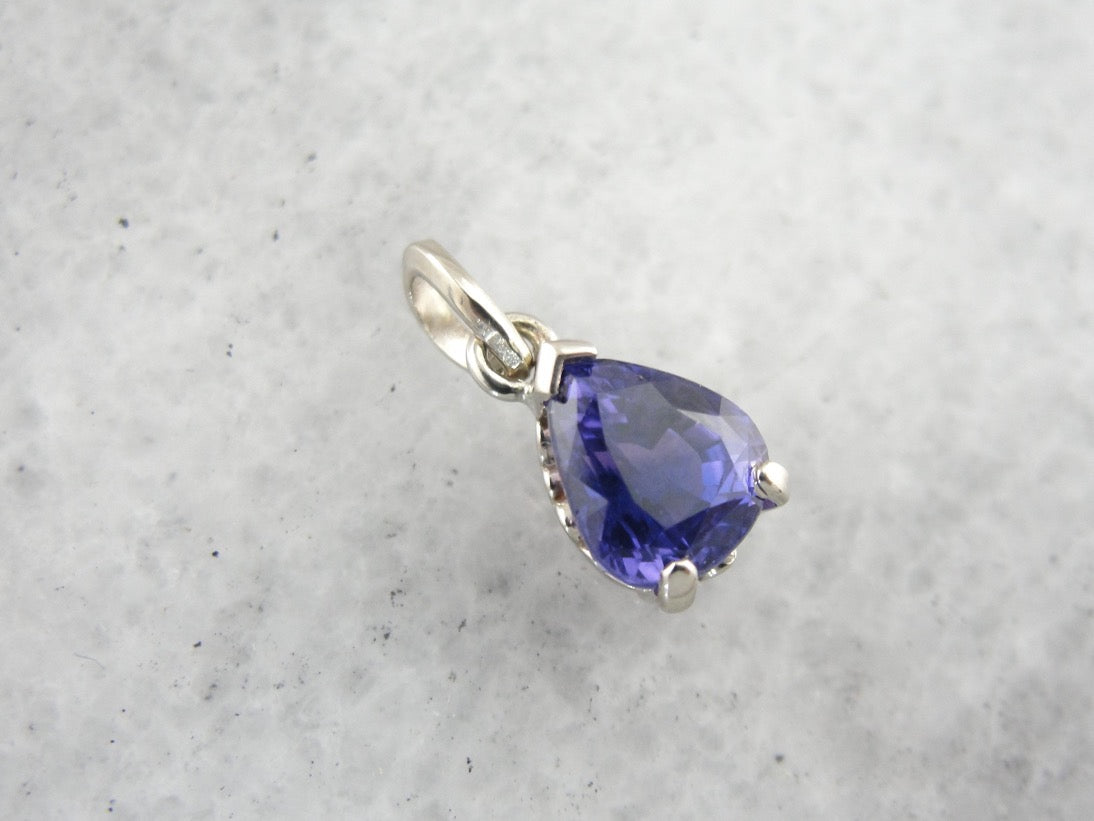 Fine Purple Sapphire Pendant in White Gold Filigree Basket Setting