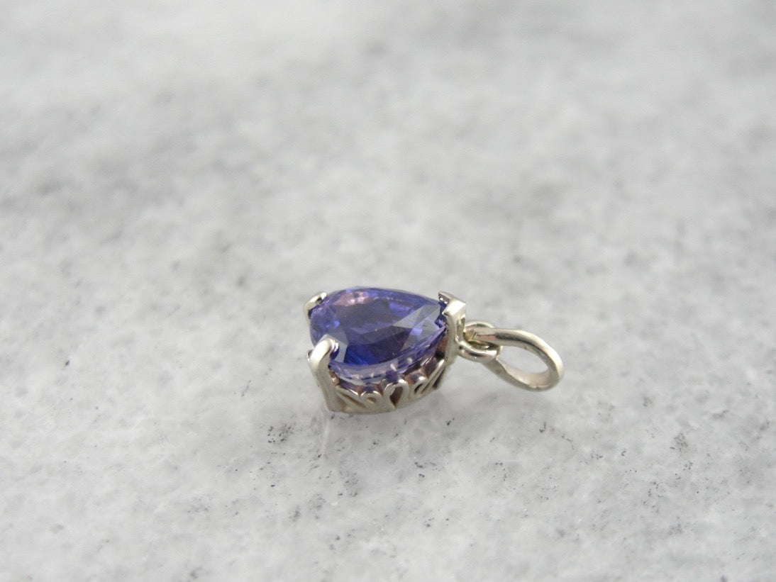 Fine Purple Sapphire Pendant in White Gold Filigree Basket Setting