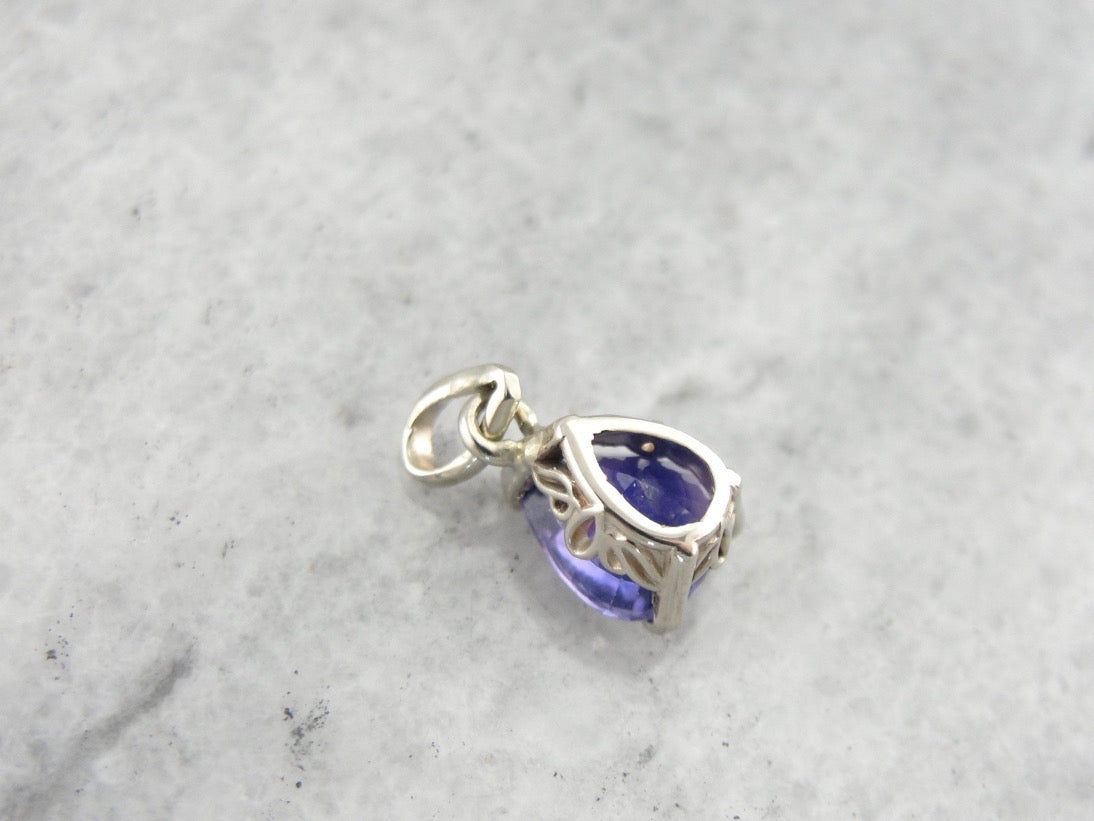 Fine Purple Sapphire Pendant in White Gold Filigree Basket Setting