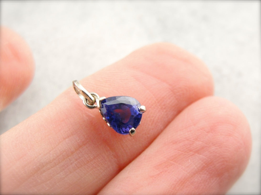 Fine Purple Sapphire Pendant in White Gold Filigree Basket Setting