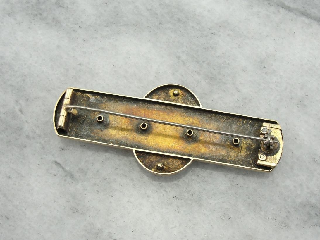 Ornate and Elegant: Victorian Gothic Enamel Brooch