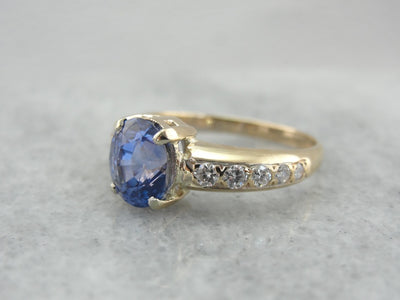 Periwinkle Blue Sapphire Engagement Ring with Diamond Accented Shoulders