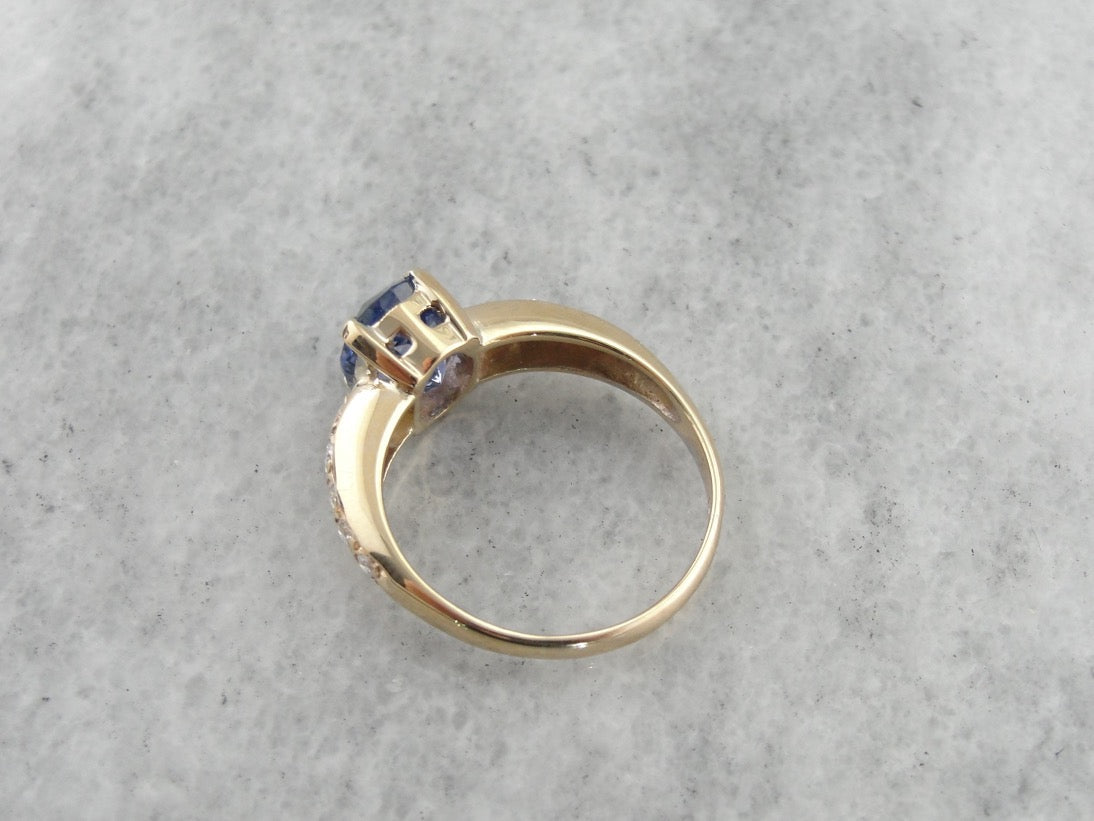 Periwinkle Blue Sapphire Engagement Ring with Diamond Accented Shoulders