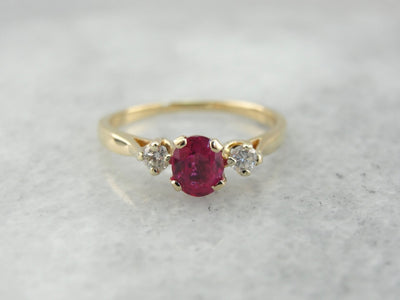 Pretty Pink Sapphire Three Stone Engagement Ring
