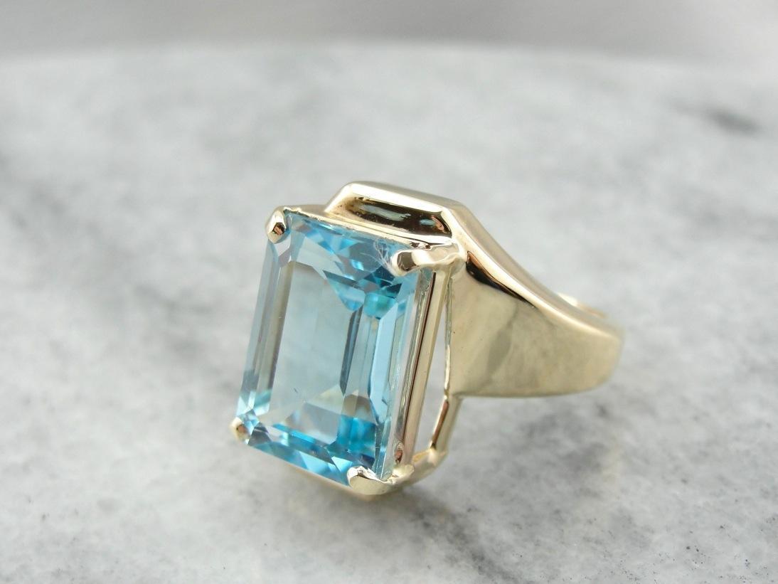 Sleek Modernist Blue Topaz Bypass Ring