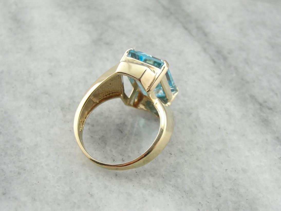 Sleek Modernist Blue Topaz Bypass Ring