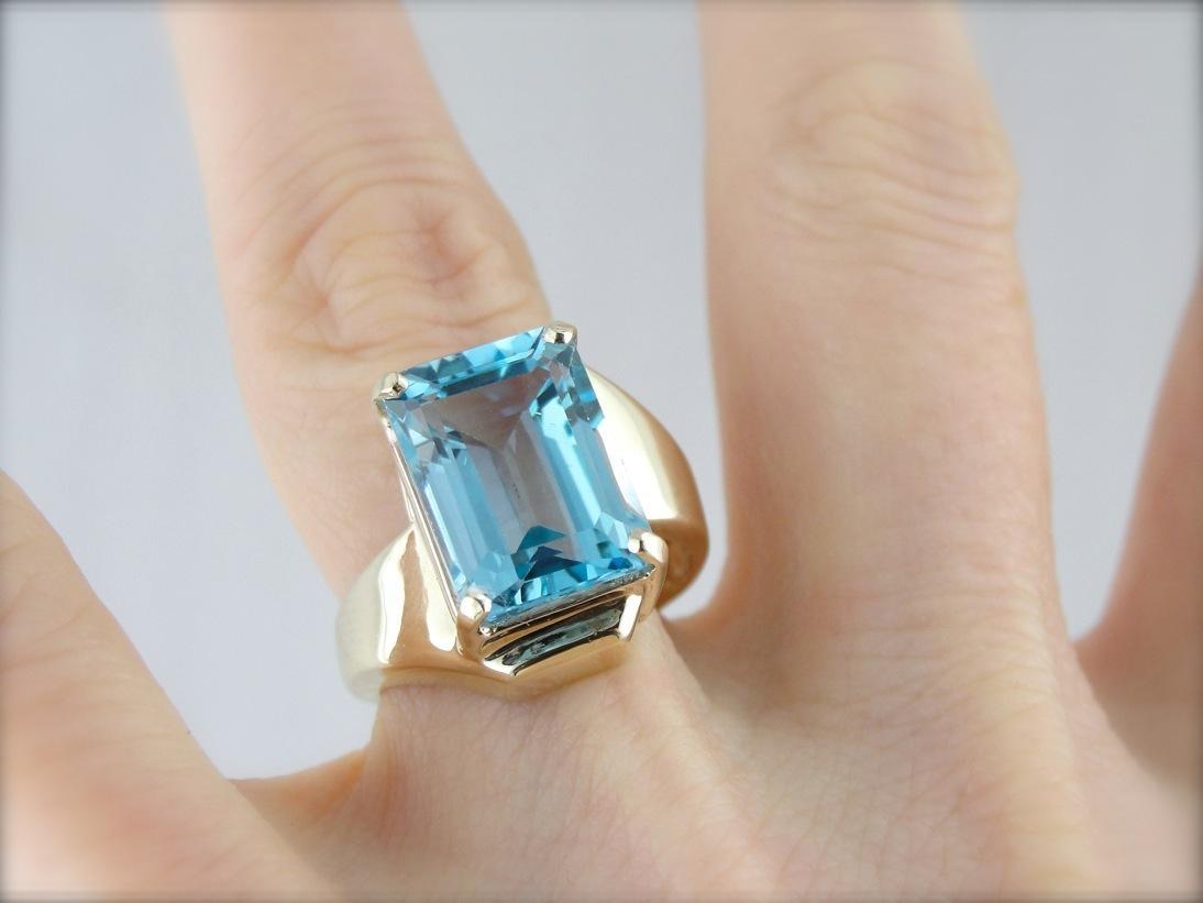 Sleek Modernist Blue Topaz Bypass Ring