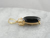 Mid Century Sleek Black Onyx Pendant with Faceted Top, High Karat Gold