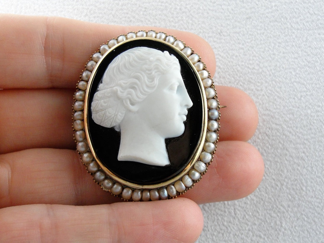 The Female Apostle Juniah: Antique Natural Pearl and Hardstone Black and White Onyx Cameo Brooch