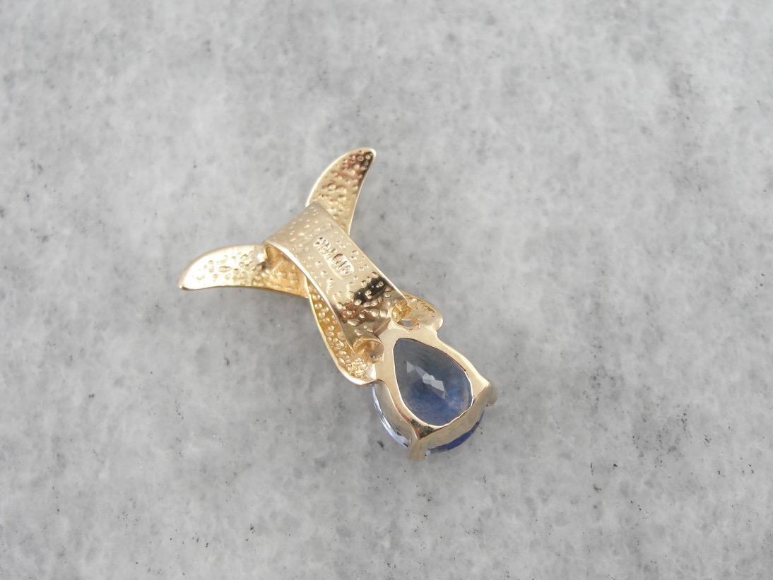 Omega Slide: Modernist Pear Cut Sapphire Pendant