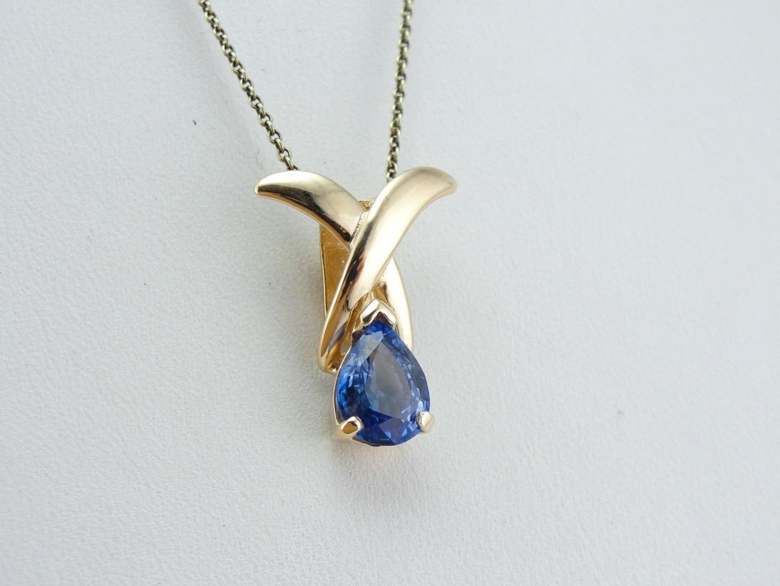 Omega Slide: Modernist Pear Cut Sapphire Pendant