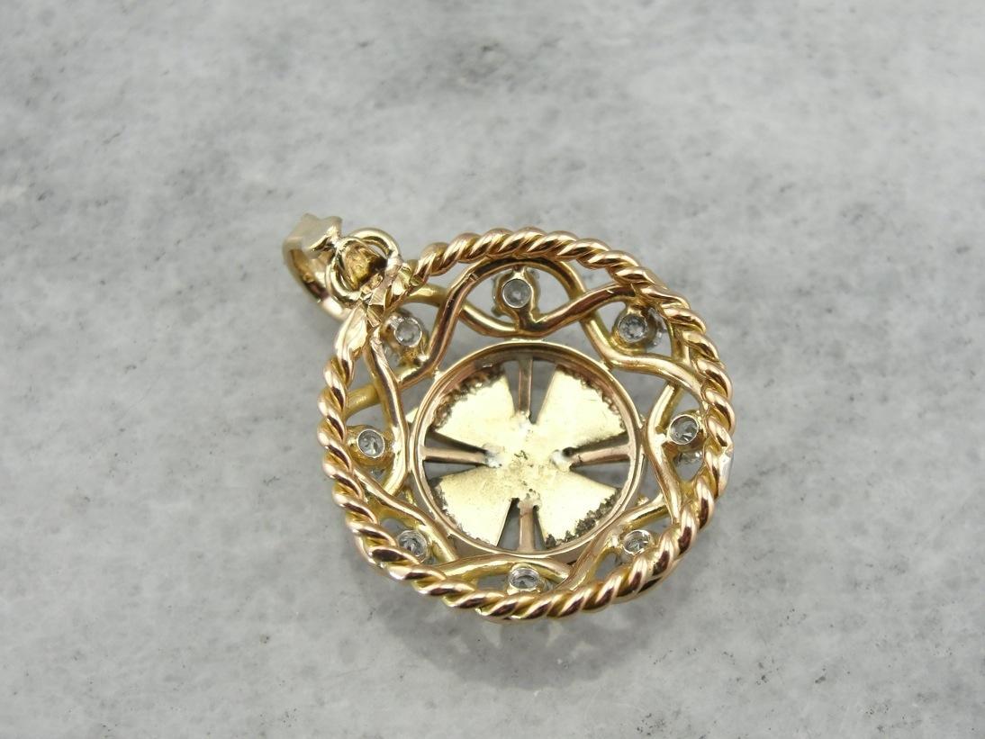 Ruby and Iron, a Vintage Enamel, Diamond and Gold Cross Pendant