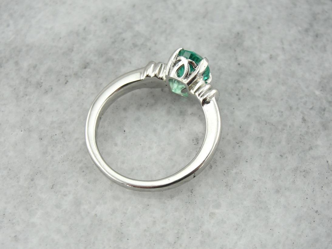 Gorgeous! Bright Green Emerald and Platinum Solitaire Ring for Any Occasion