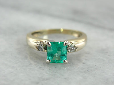 Modern Emerald Engagement Ring with Accents Diamonds in Yellow Gold