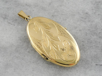 Vintage Yellow Gold Locket with Scrolling Floral Motif