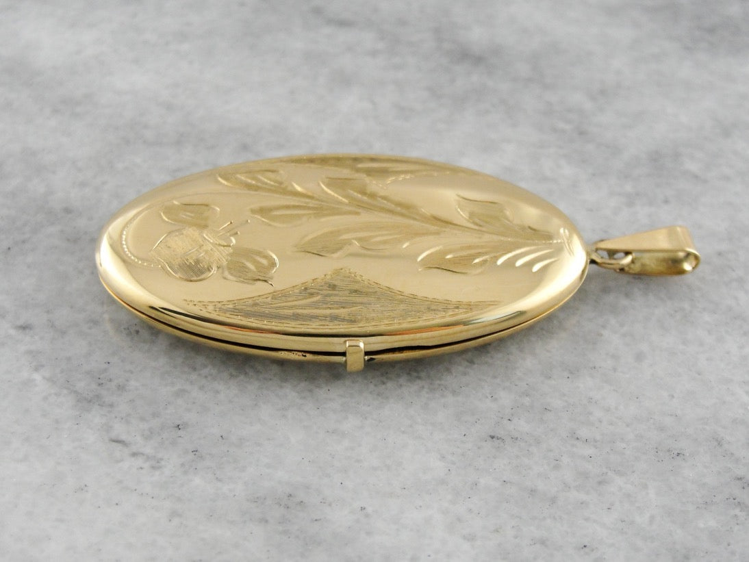 Vintage Yellow Gold Locket with Scrolling Floral Motif