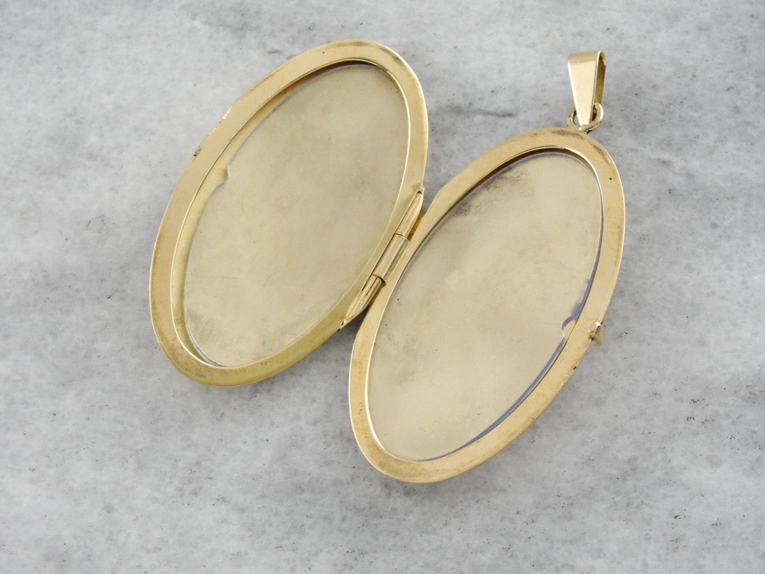 Vintage Yellow Gold Locket with Scrolling Floral Motif