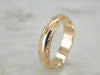 Faceted Edge Domed Gold Wedding Band