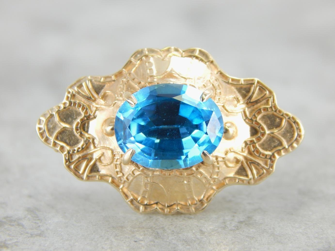 Colgante deslizante adornado con topacio azul