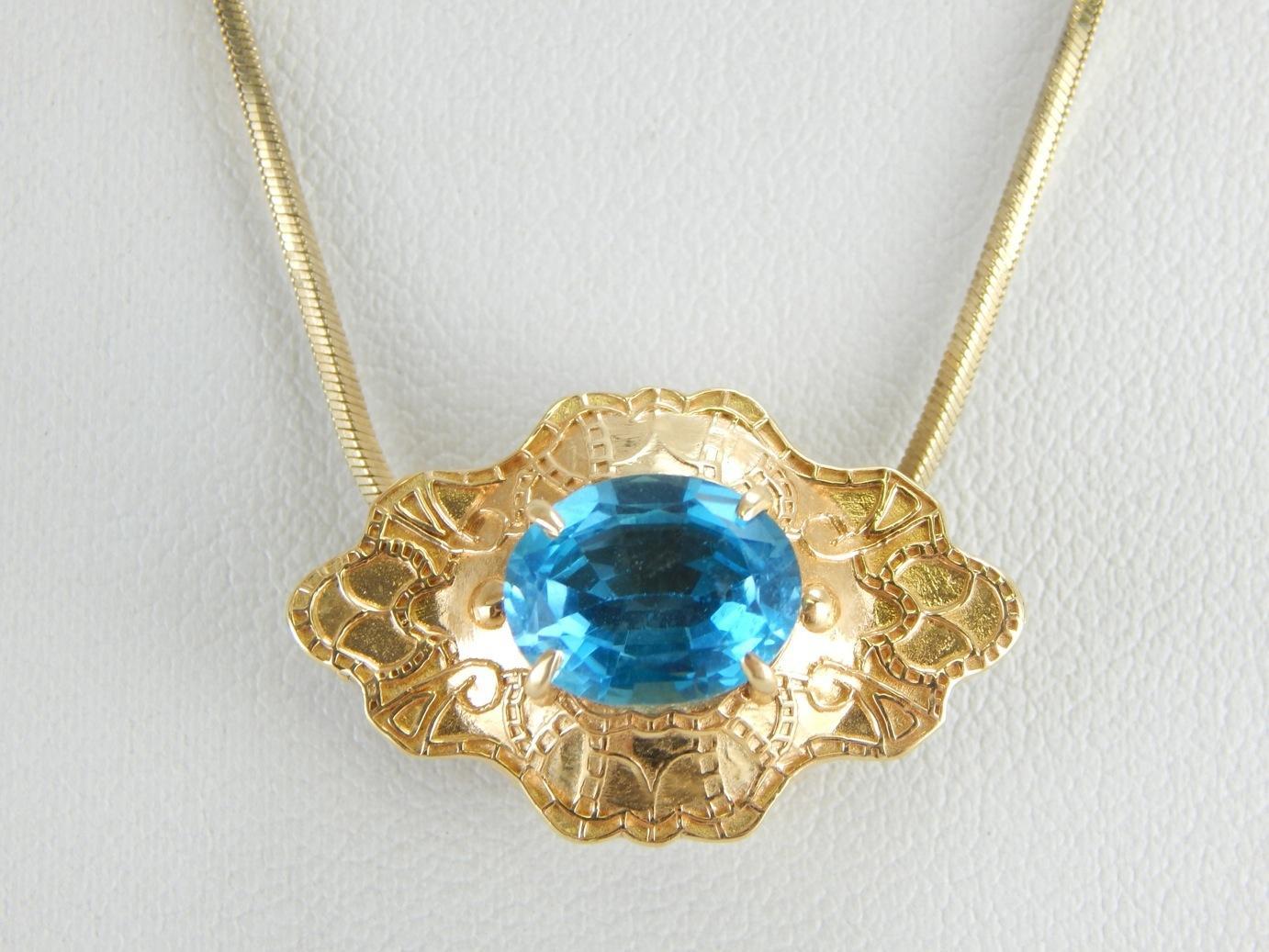 Colgante deslizante adornado con topacio azul