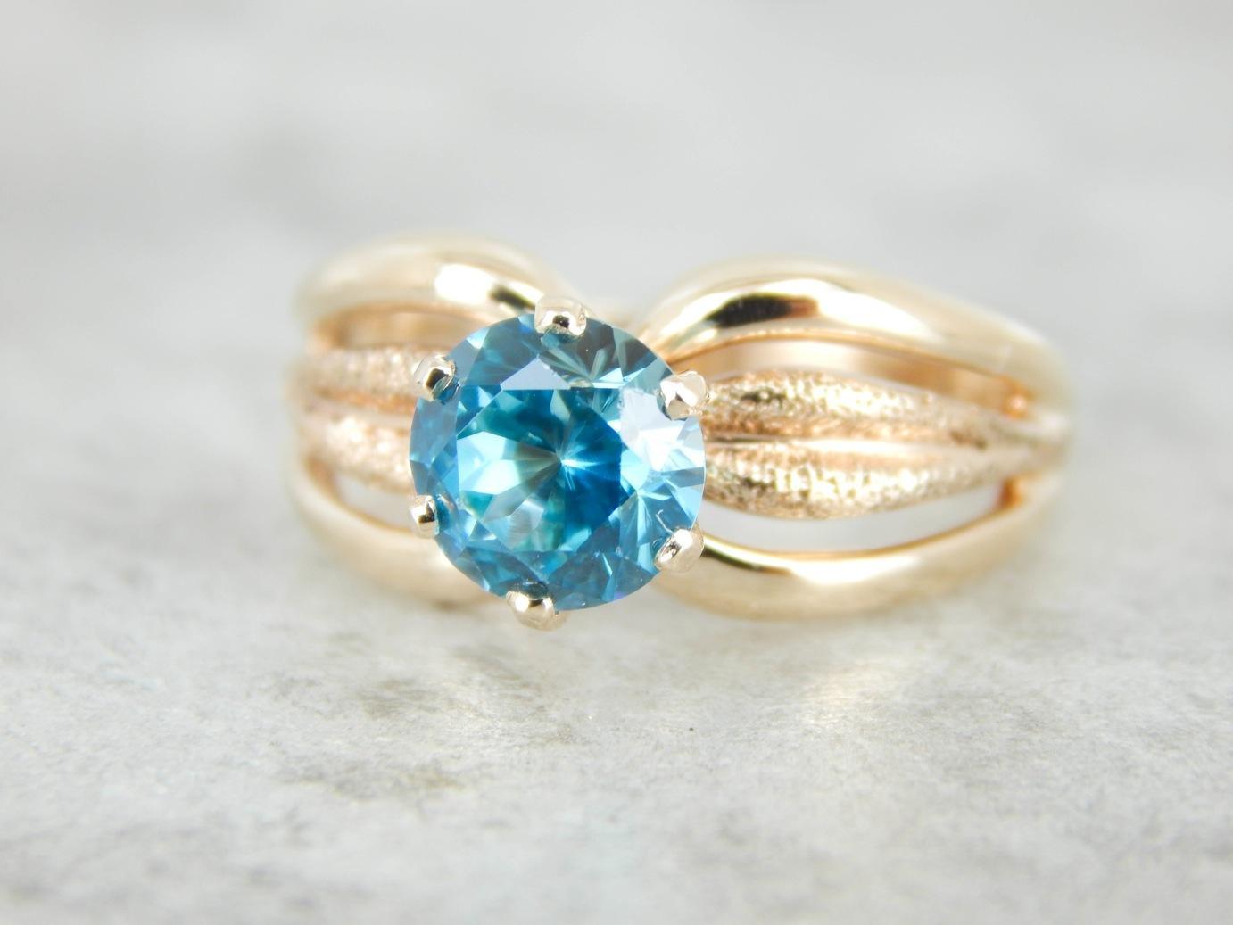 Blue Zircon Gold Solitaire Ring