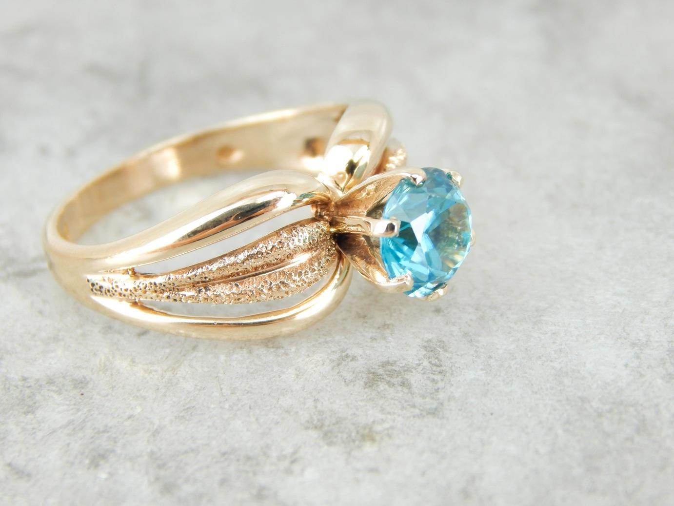 Blue Zircon Gold Solitaire Ring