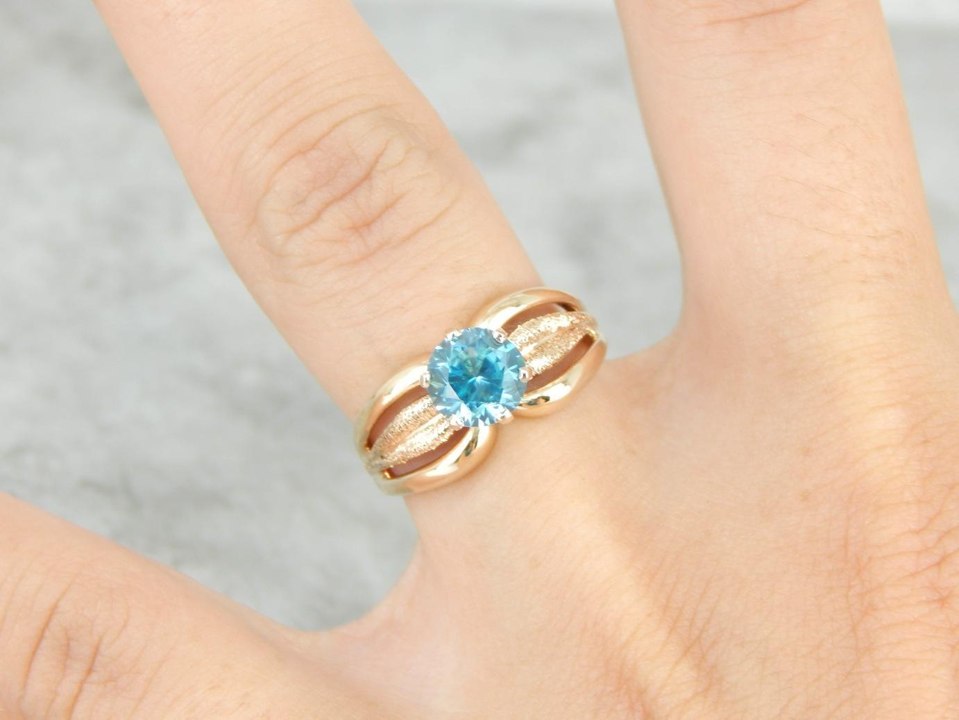 Blue Zircon Gold Solitaire Ring