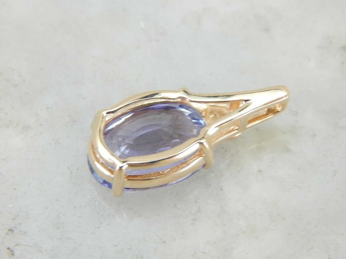 Statement Jewel: Tanzanite Pendant in Yellow Gold
