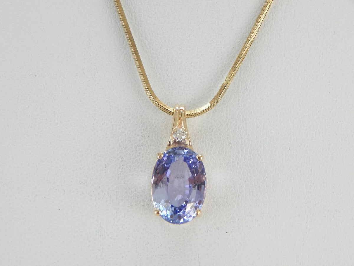 Statement Jewel: Tanzanite Pendant in Yellow Gold