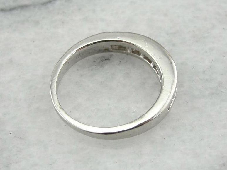 Luxurious and Weighty: Platinum and Diamond Wedding Band