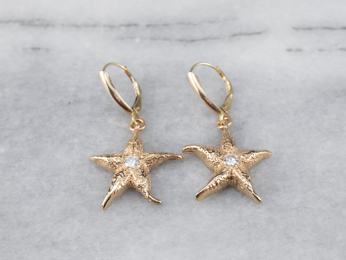 Pendientes colgantes con forma de estrella de mar y diamantes texturizados
