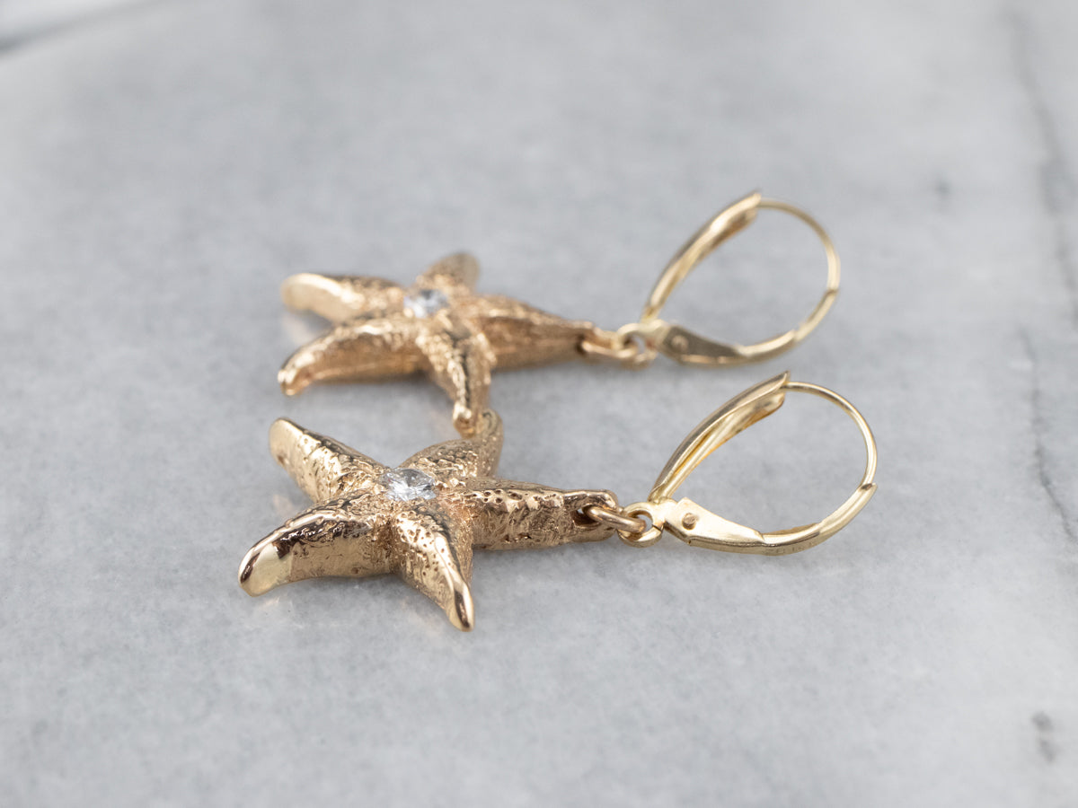 Pendientes colgantes con forma de estrella de mar y diamantes texturizados