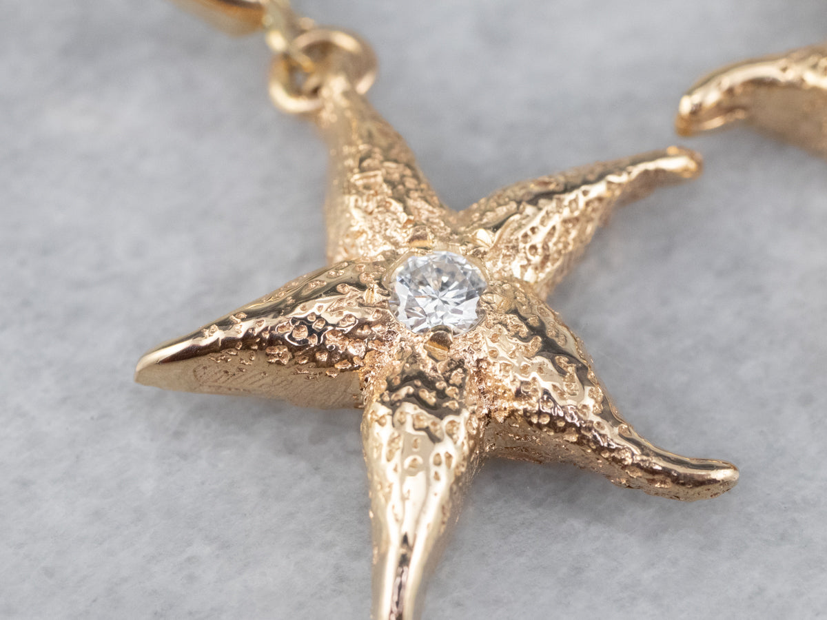 Pendientes colgantes con forma de estrella de mar y diamantes texturizados