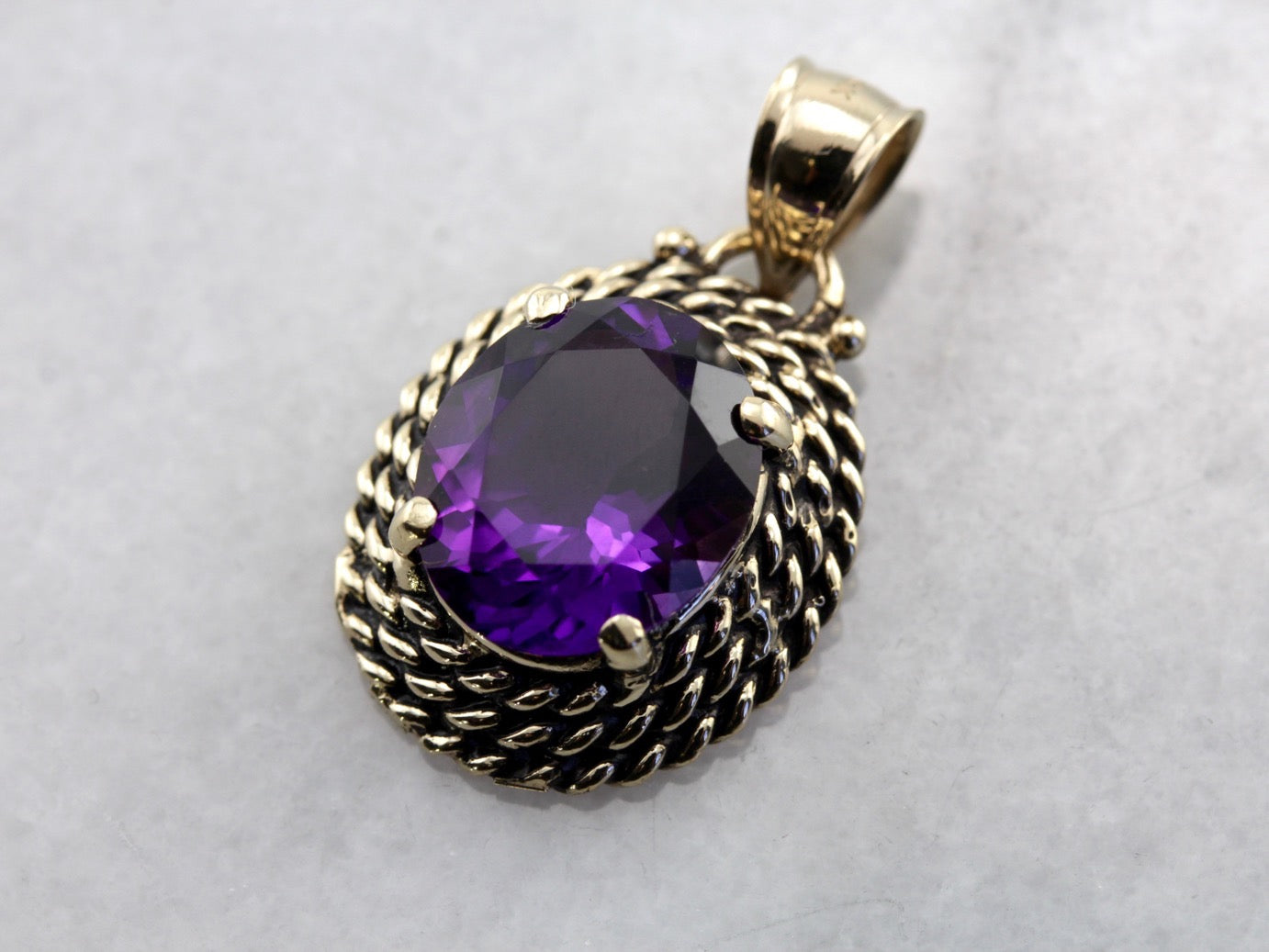 Amethyst Pendant with Triple Rope Frame in Yellow Gold