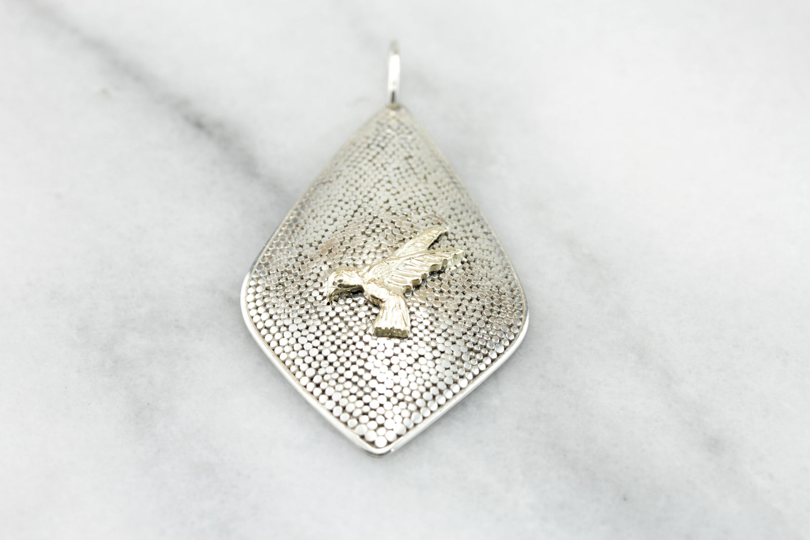 The Golden Parrot: Textured Bird in Flight Pendant