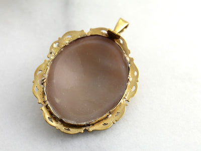 Fine Shell Cameo Pendant with Filigree Frame in Yellow Gold