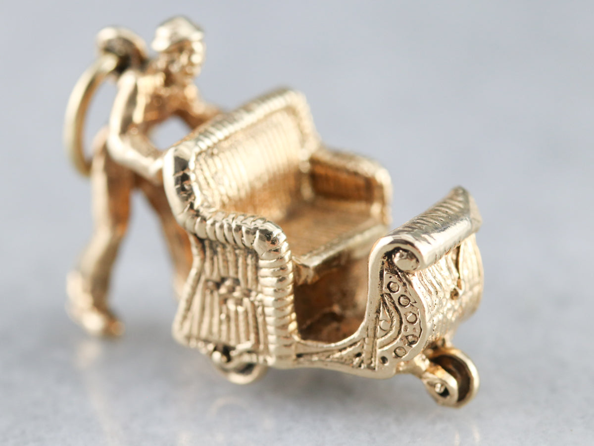 Man Pushing Sleigh Charm