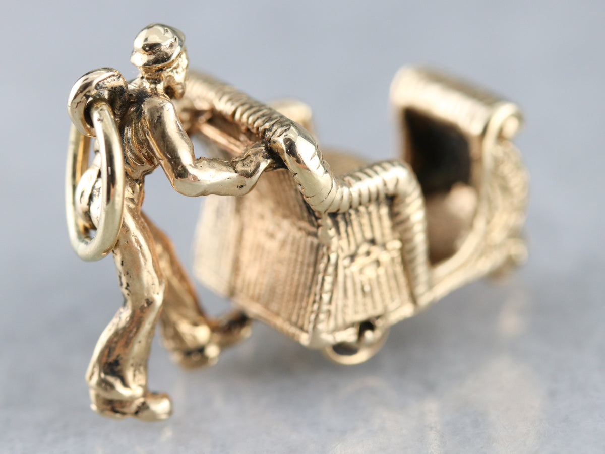 Man Pushing Sleigh Charm