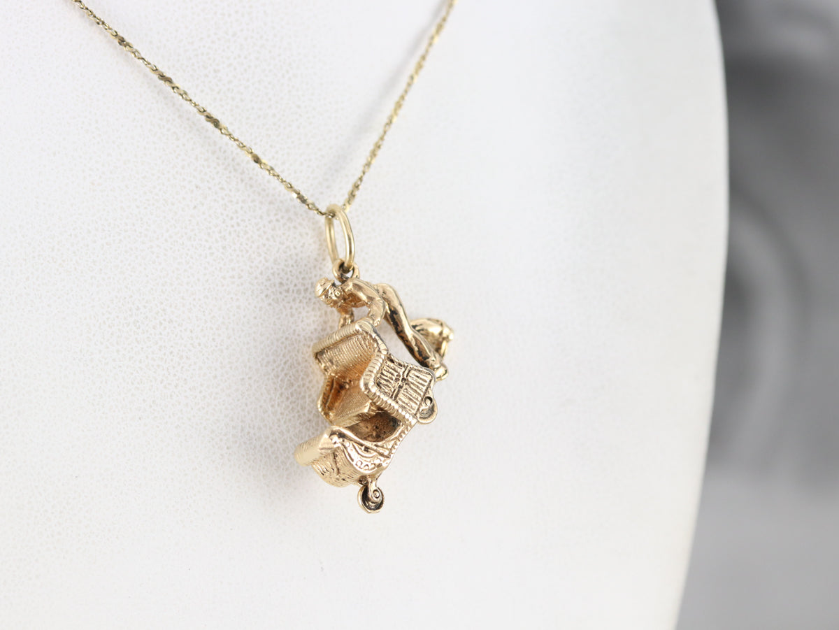 Man Pushing Sleigh Charm