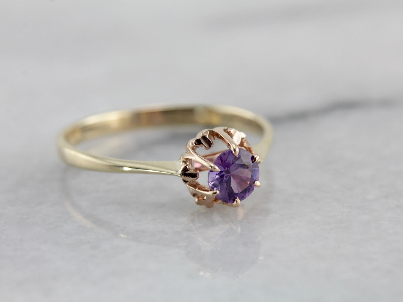 Purple Sapphire Solitaire Ring in Yellow Gold