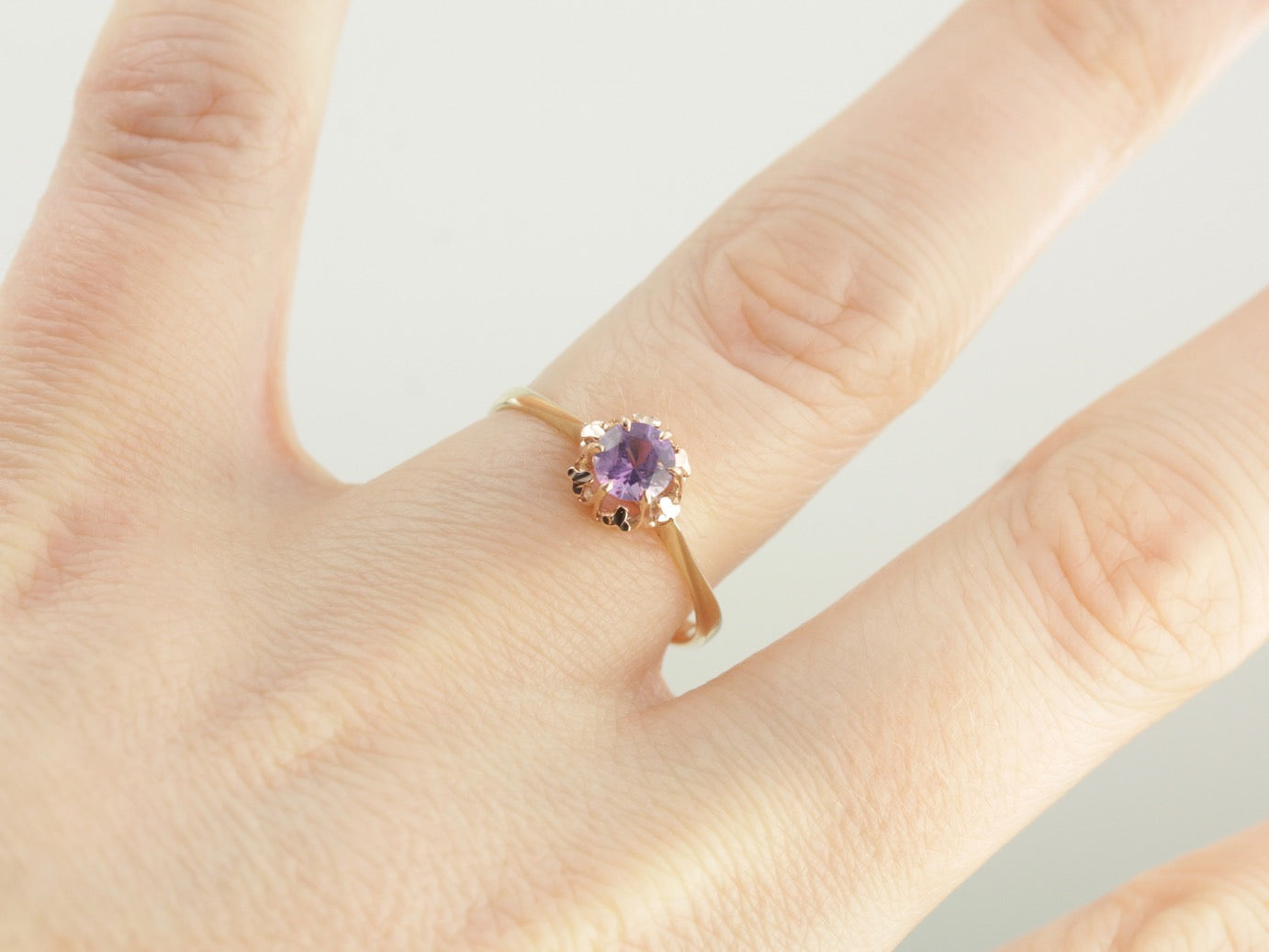 Purple Sapphire Solitaire Ring in Yellow Gold