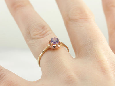 Purple Sapphire Solitaire Ring in Yellow Gold