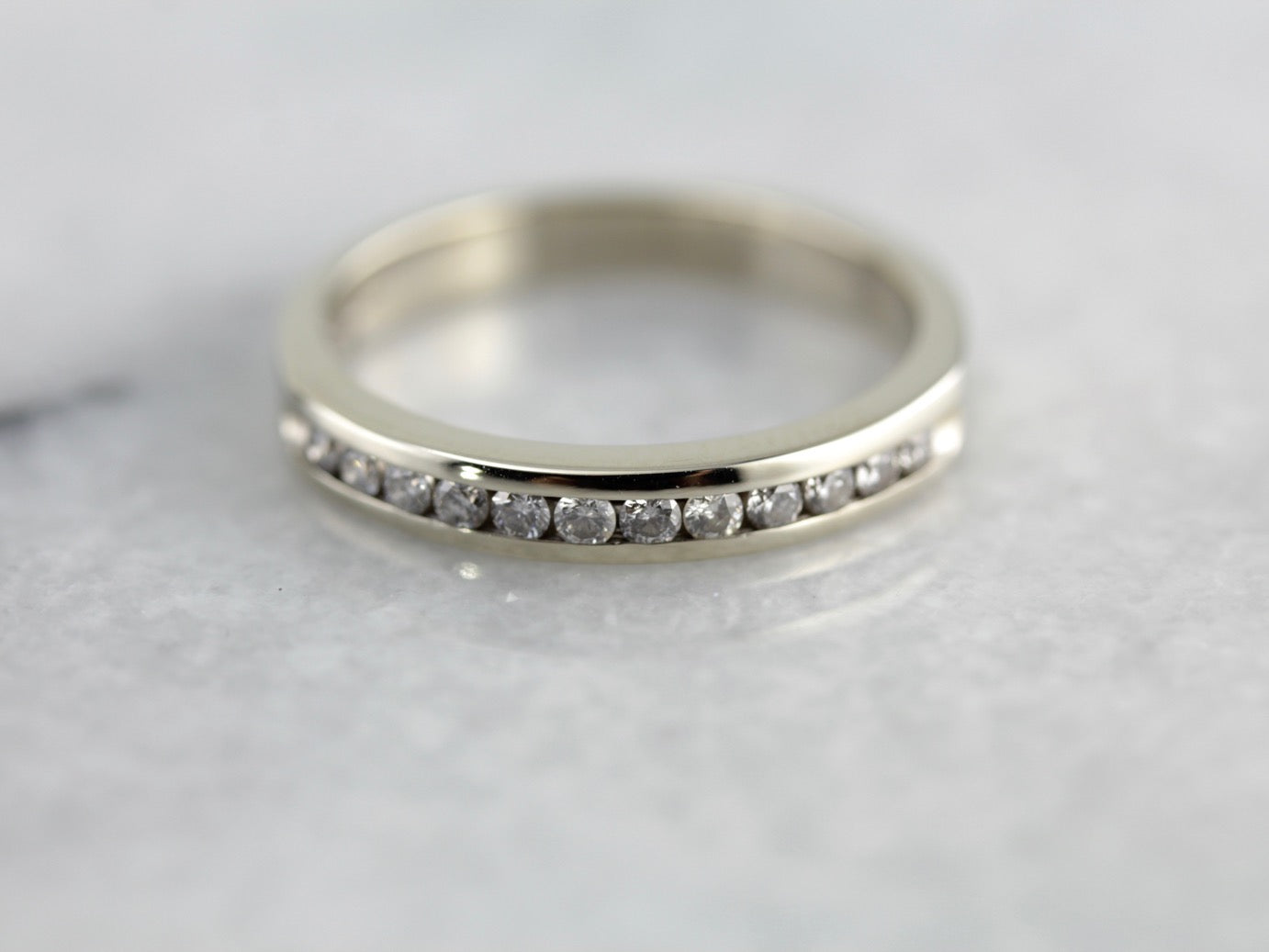 White Gold and Diamond Channel Set Wedding Band