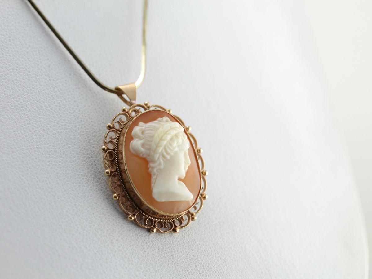 Colgante de broche de filigrana de oro cameo adornado
